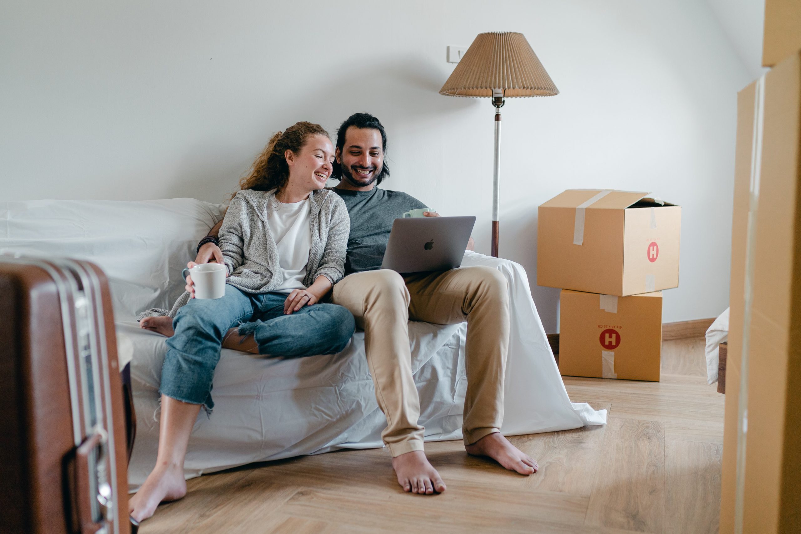 couple using a macbook