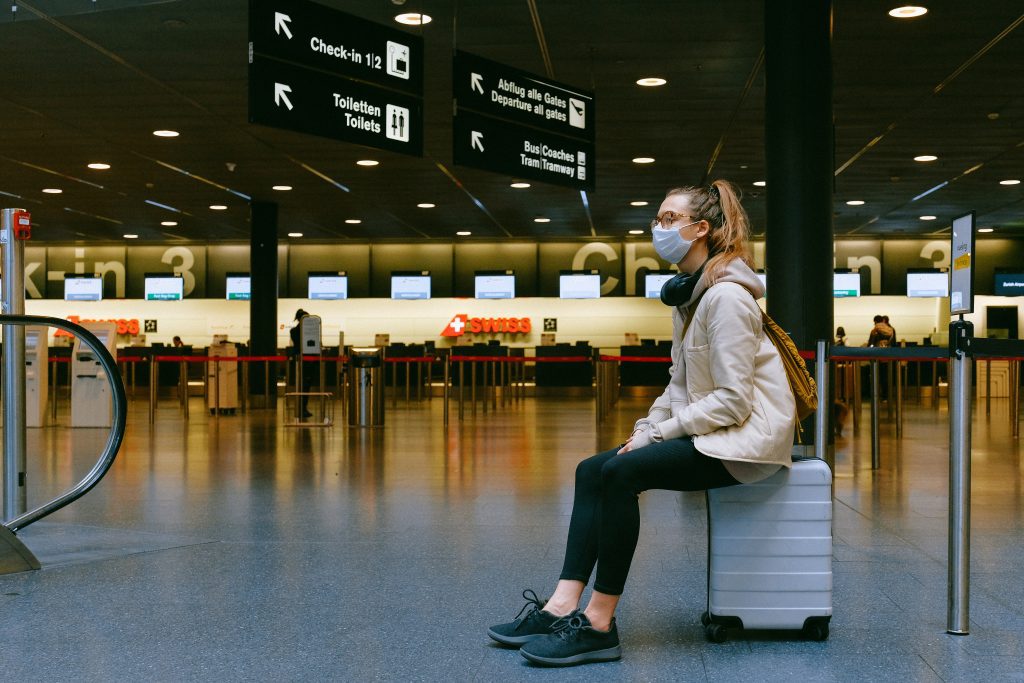 <img style="padding:20px; width:30%" alt="girl in airport">